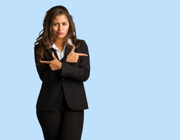 Full body young busines woman decide between two options