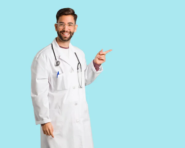 Young Doctor Man Pointing Side Finger — Stock Photo, Image