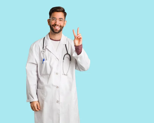 Young Doctor Man Showing Number Two — Stock Photo, Image