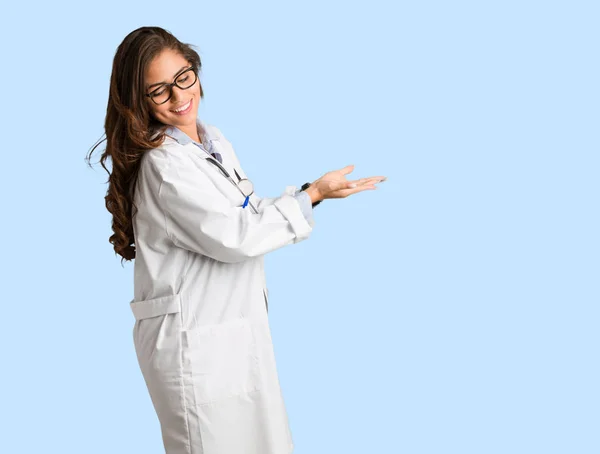 Full Body Young Doctor Woman Holding Something Hands — Stock Photo, Image