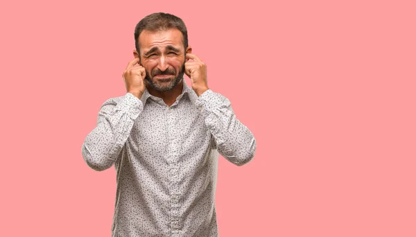 Caucasian Man Grey Brackground Covering Ears Hands — Stock Photo, Image