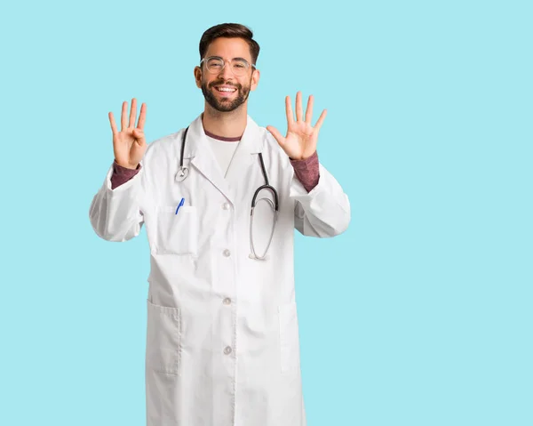 Young Doctor Man Showing Number Nine — Stock Photo, Image