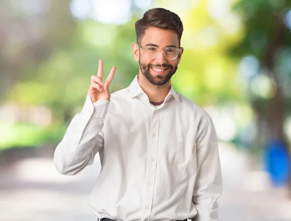 Joven Hombre Negocios Guapo Mostrando Número Dos — Foto de Stock