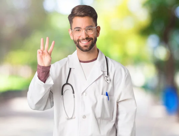 Young Doctor Man Showing Number Three — Stock Photo, Image