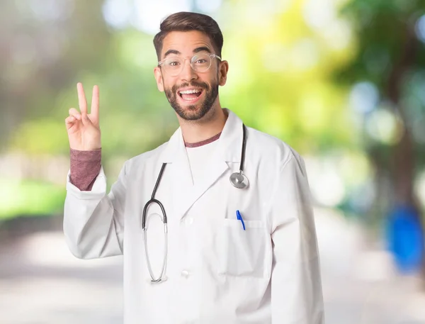 Young Doctor Man Doing Gesture Victory — Stock Photo, Image