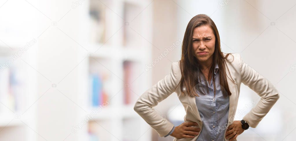 Caucasian business young woman scolding someone very angry