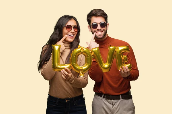 Young Couple Valentines Day Smiles Pointing Mouth — Stock Photo, Image