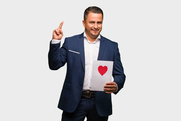 Middle Aged Latin Man Celebrating Valentines Day Crossing Fingers Having — Stock Photo, Image