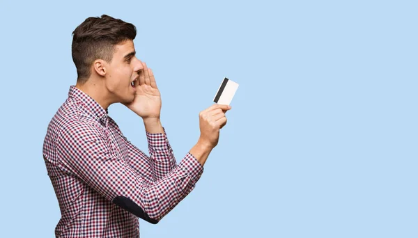 Young Man Holding Credit Card Whispering Gossip Undertone — Stock Photo, Image