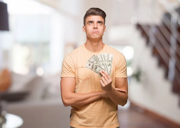 Jovem Segurando Dólares Cansado Entediado — Fotografia de Stock