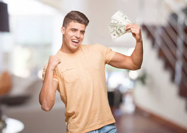 Молодий Чоловік Тримає Долари Який Здається — стокове фото