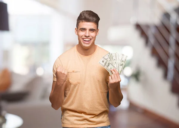 Joven Sosteniendo Dólares Sorprendido Sorprendido — Foto de Stock