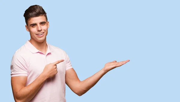 Young Handsome Man Holding Something Hand — Stock Photo, Image