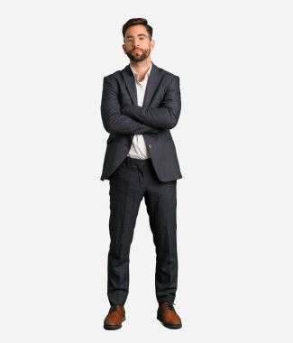 Young handsome business man crossing arms relaxed clipart