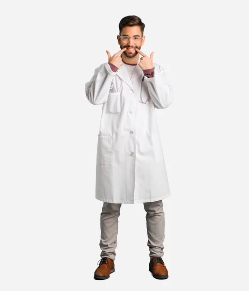 Young Doctor Man Smiles Pointing Mouth — Stock Photo, Image