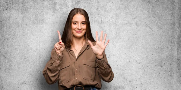 Young Caucasian Woman Showing Number Six — Stock Photo, Image