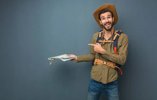 Traveler man cheerful and confident doing ok gesture