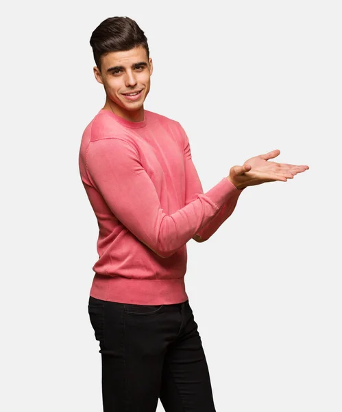 Young Funny Man Holding Something Hands — Stock Photo, Image