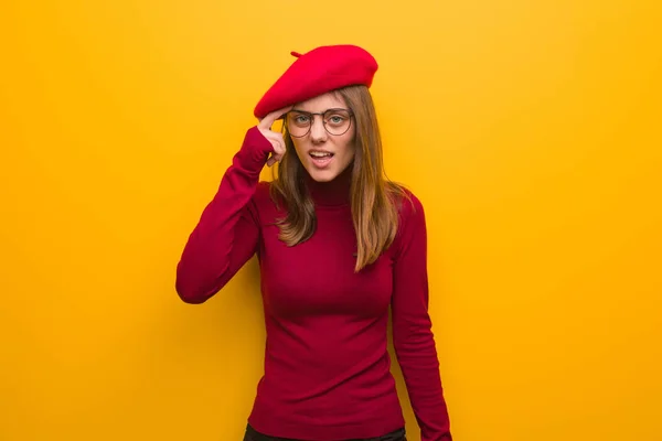 Young French Artist Woman Doing Disappointment Gesture Finger — Stock Photo, Image