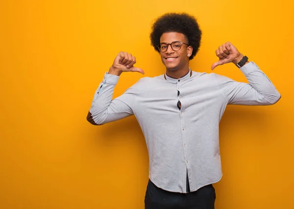 Young African American Man Orange Wall Pointing Fingers Example Follow — Stock Photo, Image