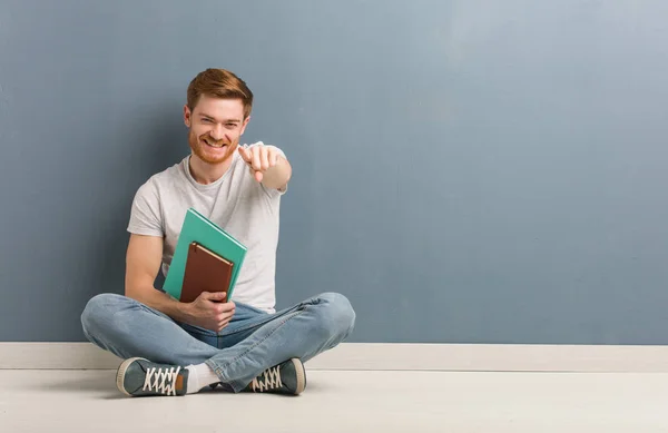 Young Redhead Student Man Sitting Floor Cheerful Smiling Pointing Front — Stock Photo, Image