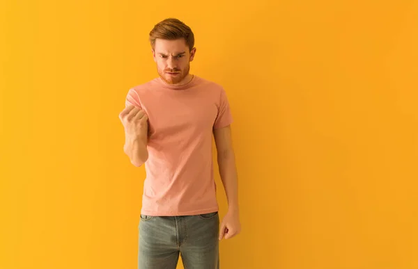 stock image Young redhead man showing fist to front, angry expression