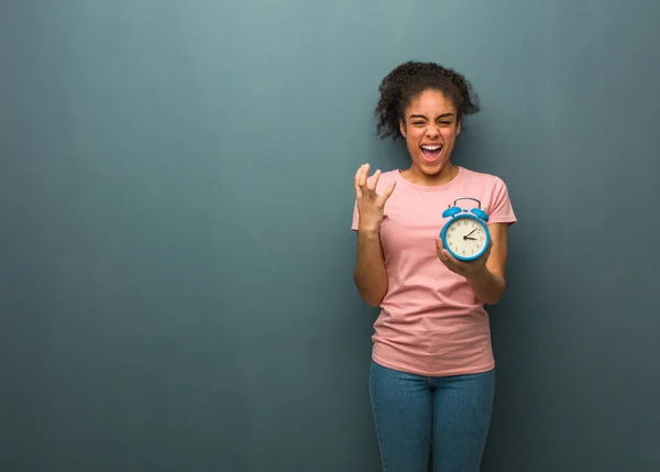 Young Black Woman Very Scared Afraid She Holding Alarm Clock — 스톡 사진