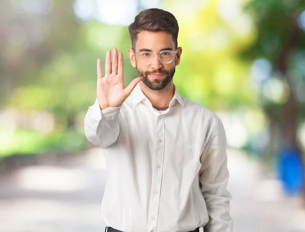 Joven Hombre Negocios Guapo Poniendo Mano Frente —  Fotos de Stock