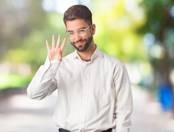 Joven Hombre Negocios Guapo Mostrando Número Cuatro — Foto de Stock