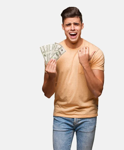 Young Man Holding Dollars Very Scared Afraid — Stock Photo, Image
