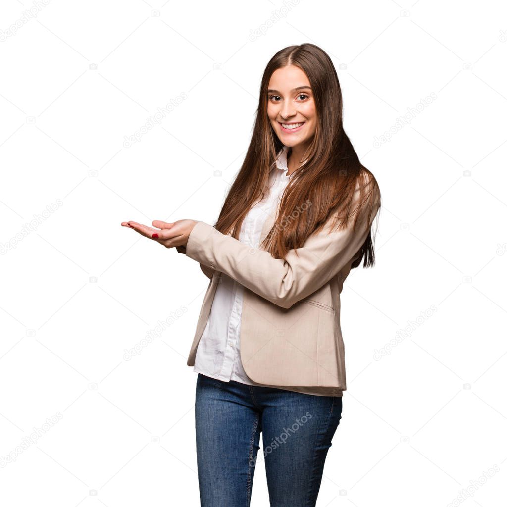 Young caucasian business woman holding something with hands