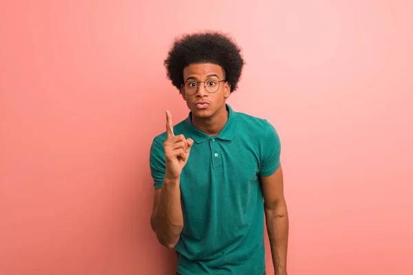 Young African American Man Pink Wall Having Idea Inspiration Concept — Stock Photo, Image