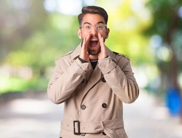 Young Man Wearing Trench Coat Shouting Something Happy Front — Stock Photo, Image