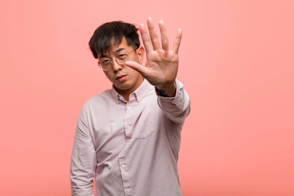 Young Chinese Man Putting Hand Front — Stock Photo, Image