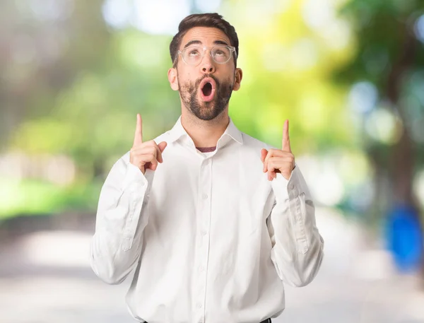 Young Handsome Business Man Surprised Pointing Show Something — Stock Photo, Image