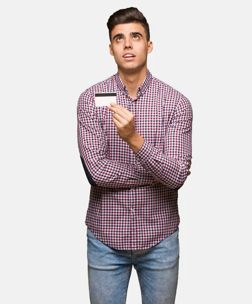 Young Man Holding Credit Card Tired Bored — Stock Photo, Image