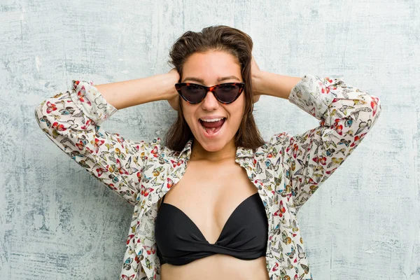 Young European Woman Wearing Bikini Covering Her Ears Hands Trying — 스톡 사진