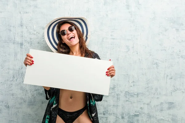 Young European Woman Wearing Bikini Holding Placard — Stock Photo, Image