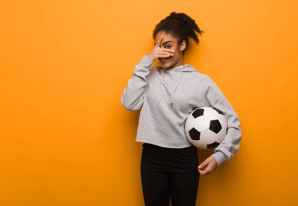 Young Fitness Black Woman Embarrassed Laughing Same Time Holding Soccer — Stock Photo, Image