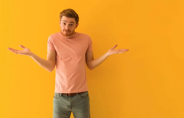 Young Redhead Man Doubting Shrugging Shoulders — Stock Photo, Image