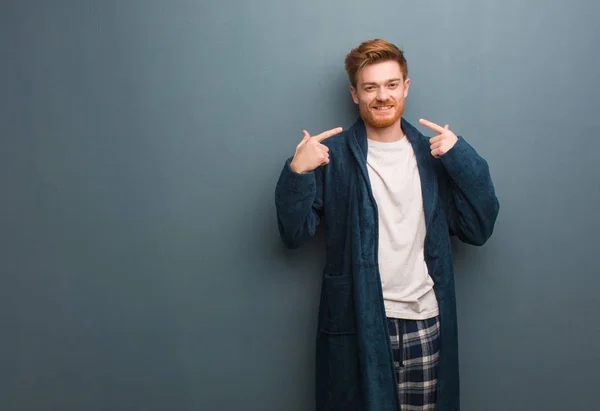 Young Redhead Man Pajama Smiles Pointing Mouth — ストック写真