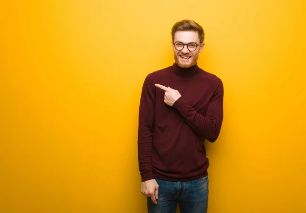 Young Smart Man Smiling Pointing Side — 스톡 사진