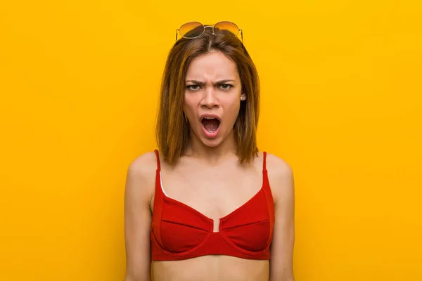 Young Caucasian Woman Wearing Bikini Sunglasses Screaming Very Angry Aggressive — Stockfoto