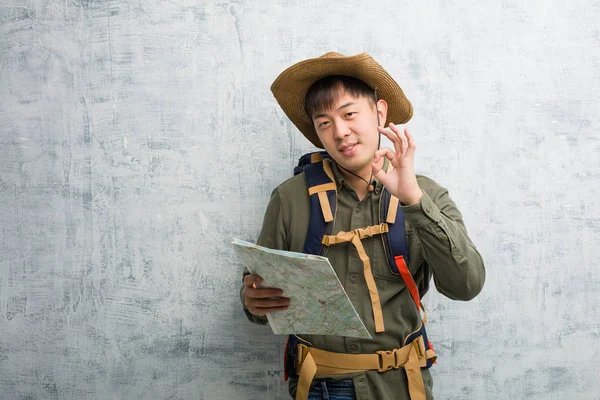 Young Chinese Explorer Man Holding Map Cheerful Confident Doing Gesture — Stock Photo, Image