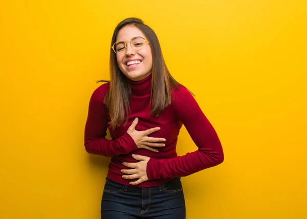 Young intellectual woman laughing and having fun