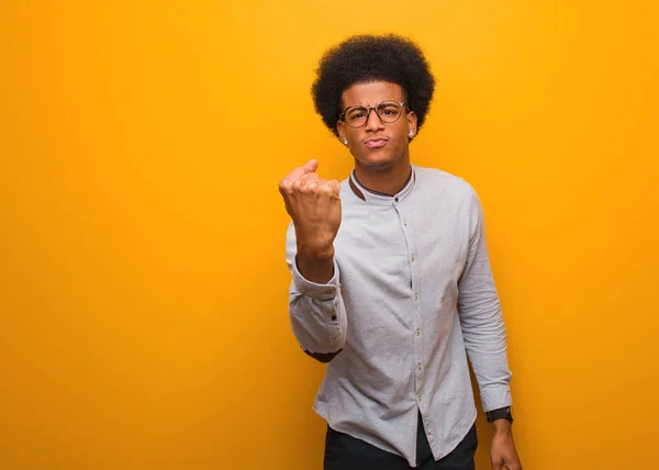 Young African American Man Orange Wall Showing Fist Front Angry — Stock Photo, Image
