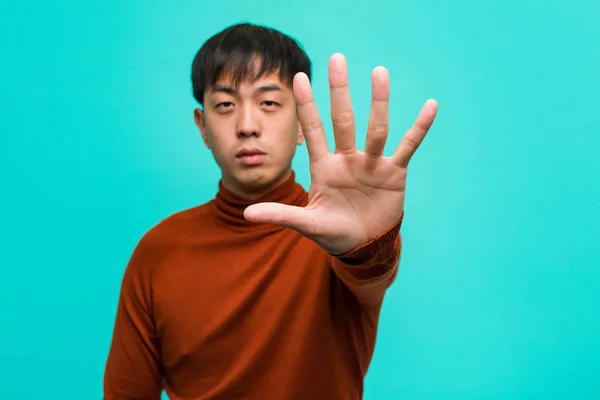 Young Chinese Man Putting Hand Front — Stock Photo, Image