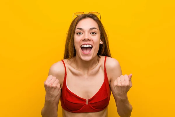 Young Caucasian Woman Wearing Bikini Sunglasses Cheering Carefree Excited Victory — Stockfoto