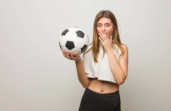 Young Fitness Russian Woman Very Scared Afraid Hidden Holding Soccer — ストック写真