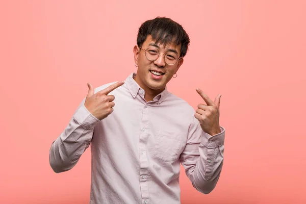 Young Chinese Man Smiles Pointing Mouth — Stock Photo, Image